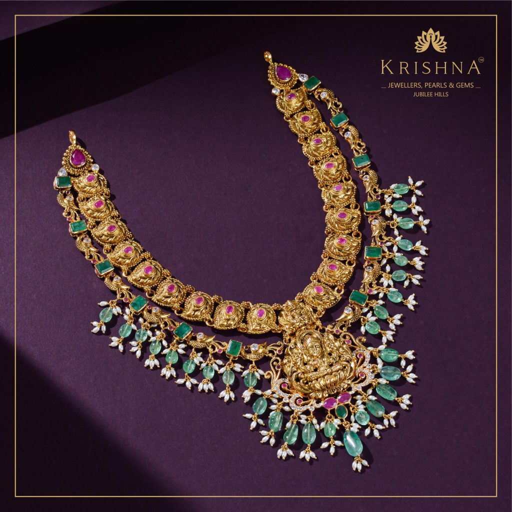 Shop Gold Lakshmi Emerald with ruby stones Necklace at Krishna Jewellers